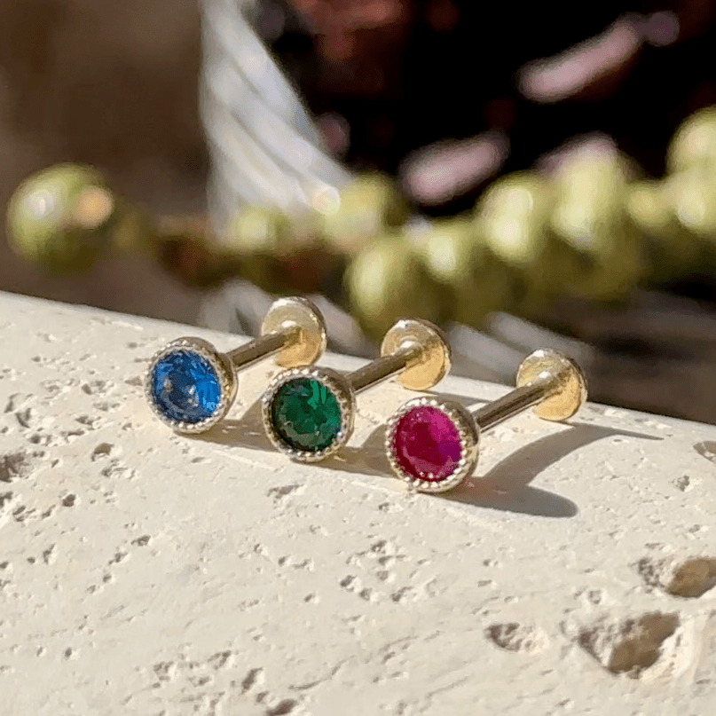 three different colored stones sitting on top of each other