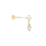 a pair of gold earrings with white stones
