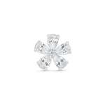 a white gold ring with three pear shaped diamonds