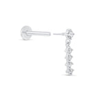 a pair of white gold and diamond earrings