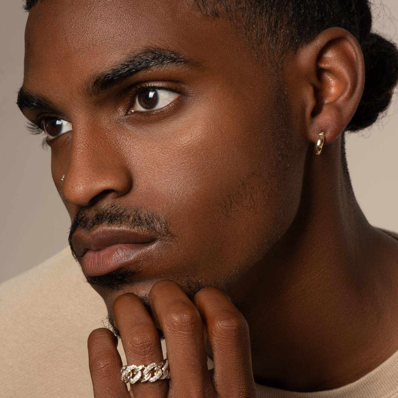 The Complete Guide to Men's Ear Piercings: What His Jewelry Says