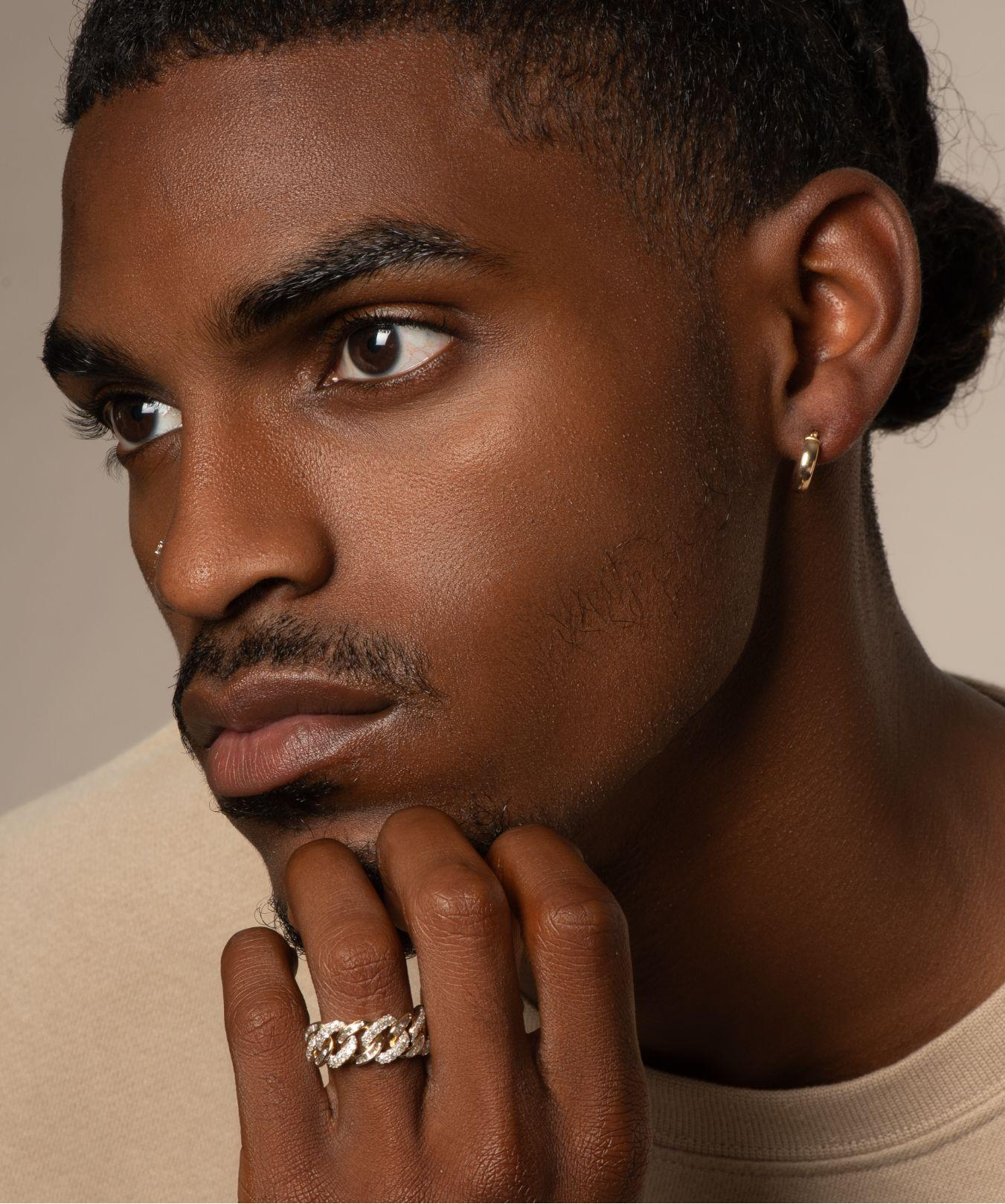 The Complete Guide to Men's Ear Piercings: What His Jewelry Says