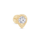 a gold ring with a heart shaped diamond