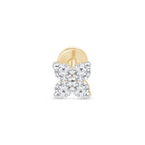 a pair of diamond earrings on a white background