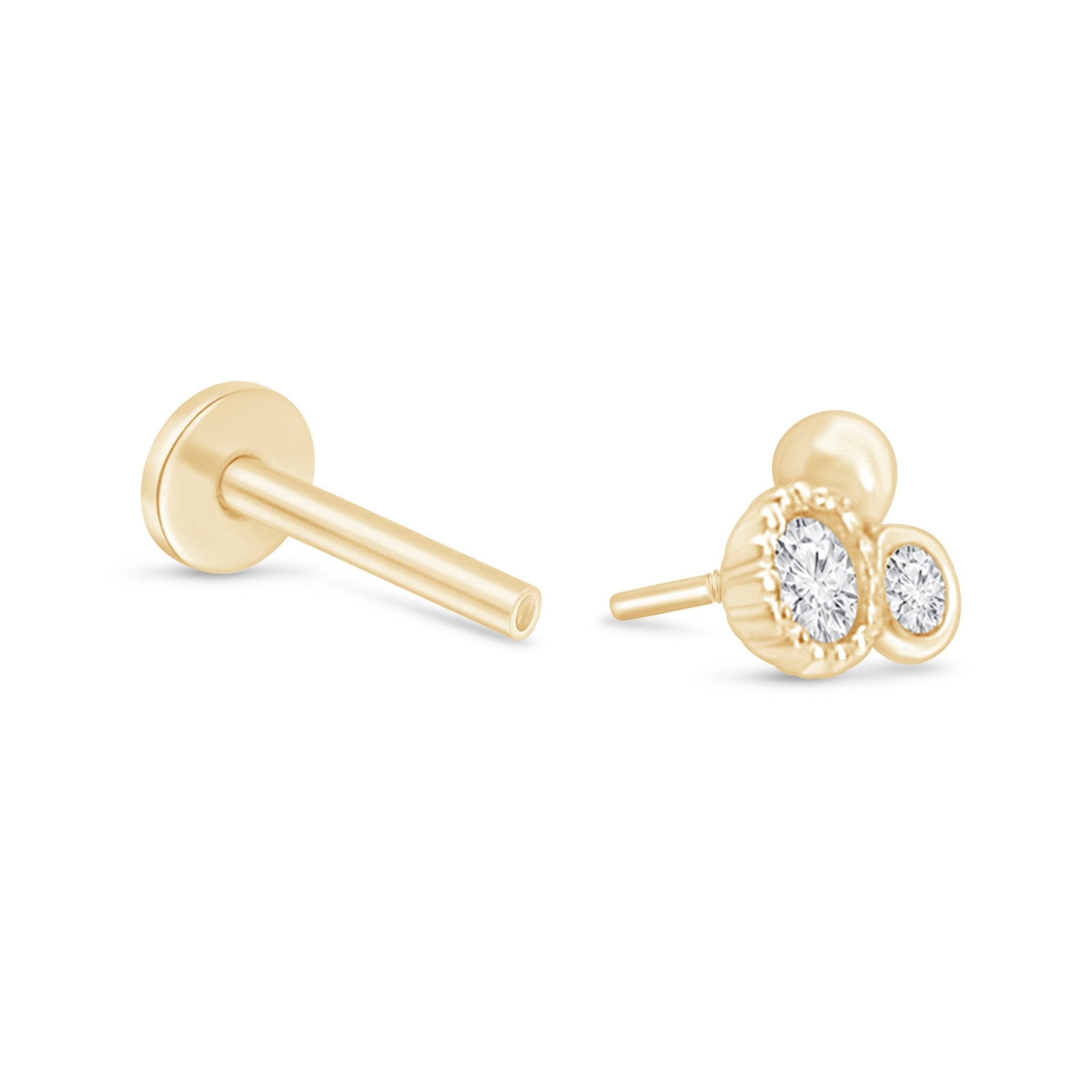 a pair of yellow gold earrings with diamonds