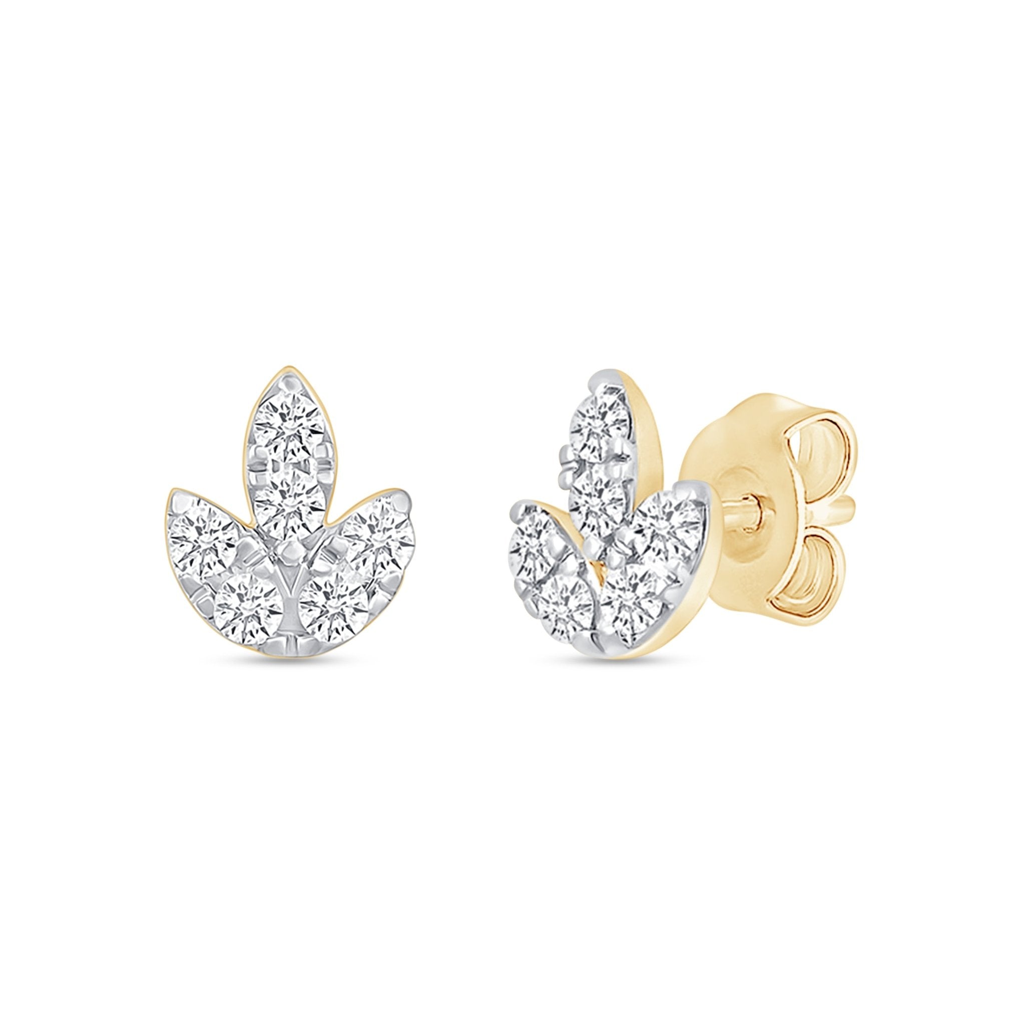 a pair of gold and diamond earrings