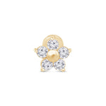 a yellow gold flower charm with clear stones