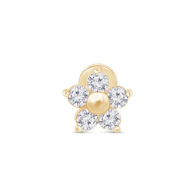 a yellow gold flower charm with clear stones