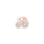 a pair of earrings with diamonds on a white background