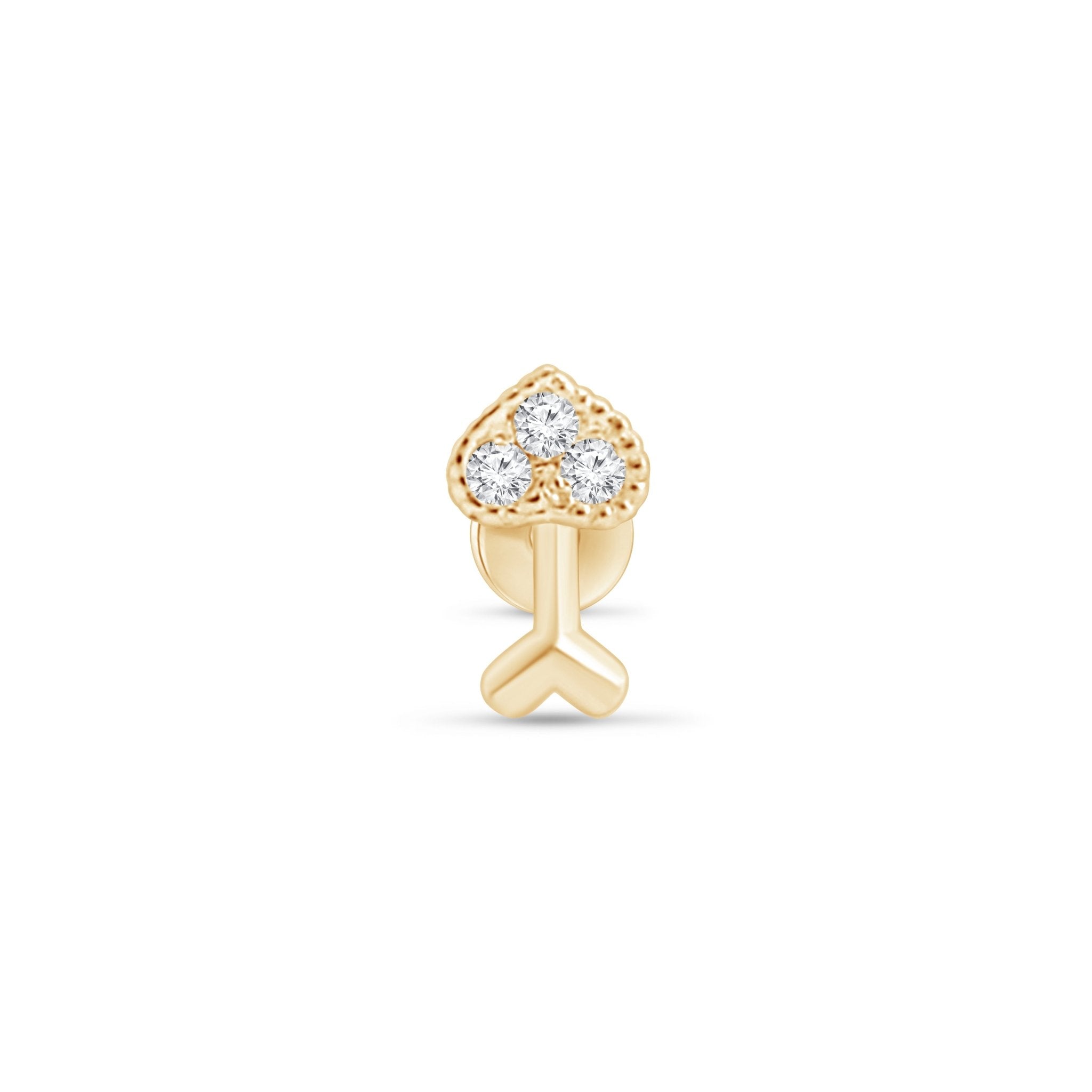 a yellow gold ring with two diamonds