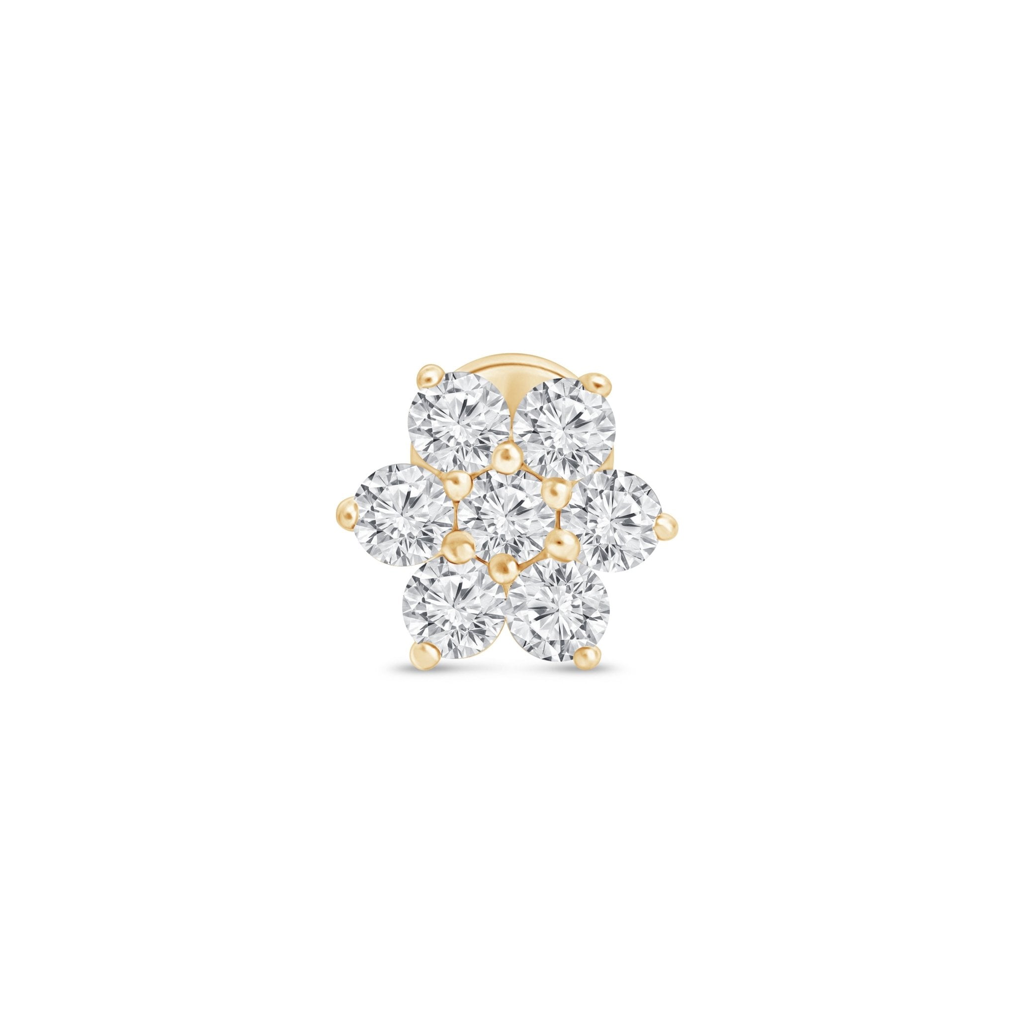 a yellow gold ring with three diamonds