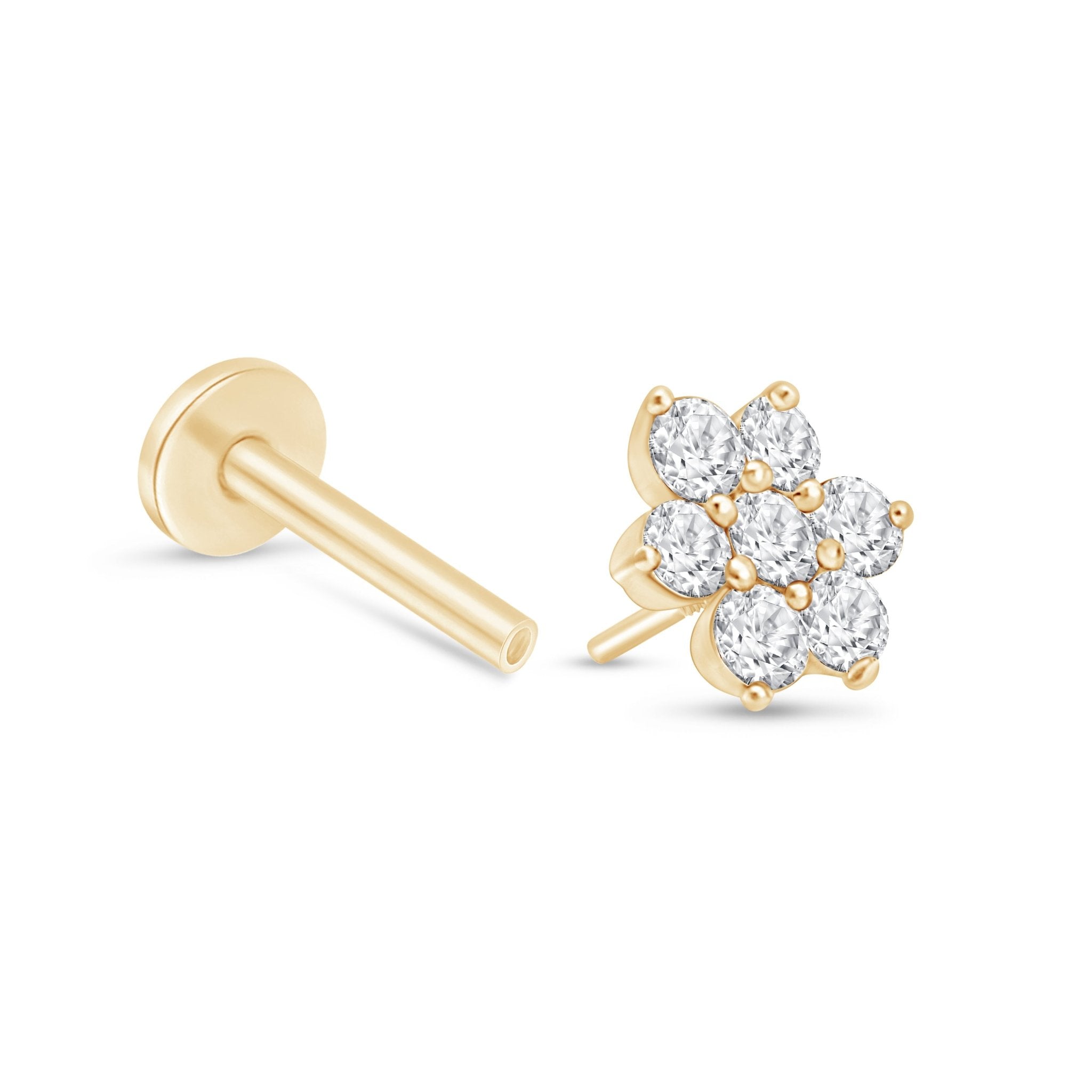 a pair of yellow gold earrings with white diamonds