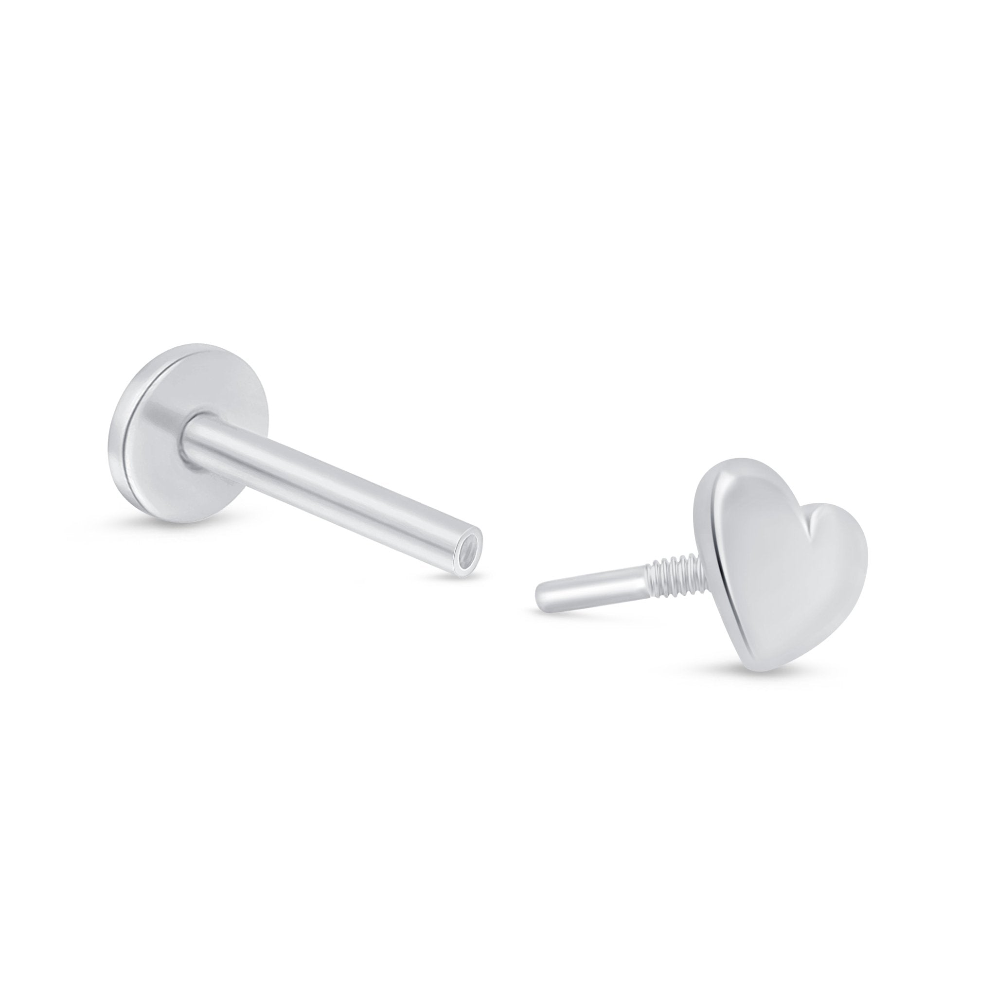 a pair of heart shaped earrings on a white background