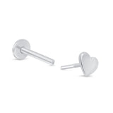 a pair of heart shaped earrings on a white background