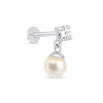 a pair of pearl and diamond earrings