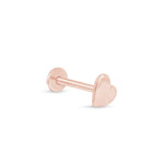 a pair of rose gold heart shaped nose studs