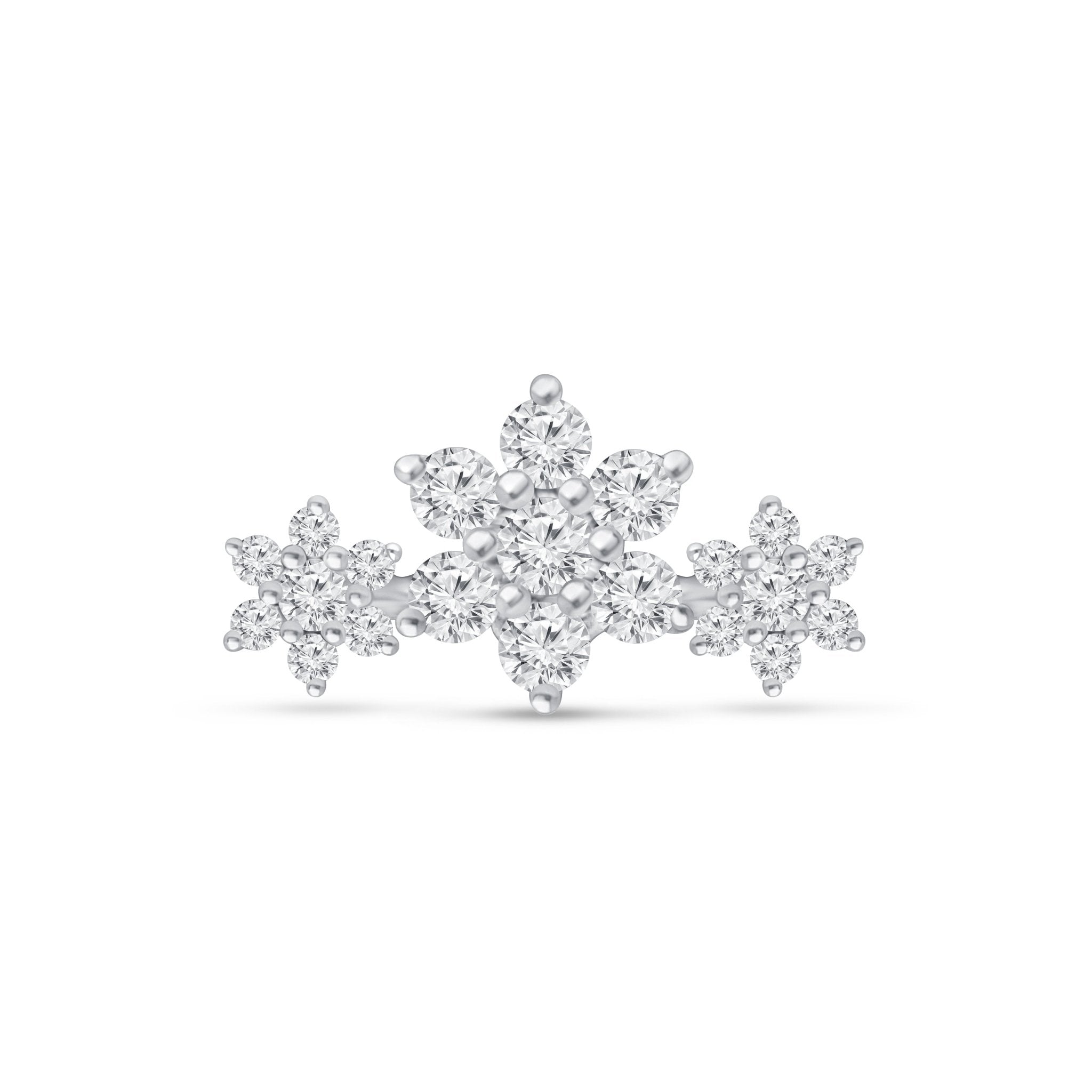 a diamond snowflake ring on a white background