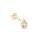 a pair of gold earrings with a diamond