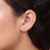 a close up of a person with a ear piercing