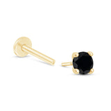 a pair of black diamond earrings in yellow gold