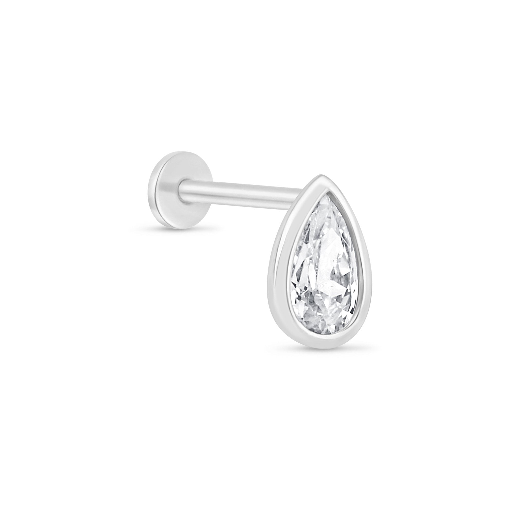 a pair of white gold earrings with a pear shaped diamond