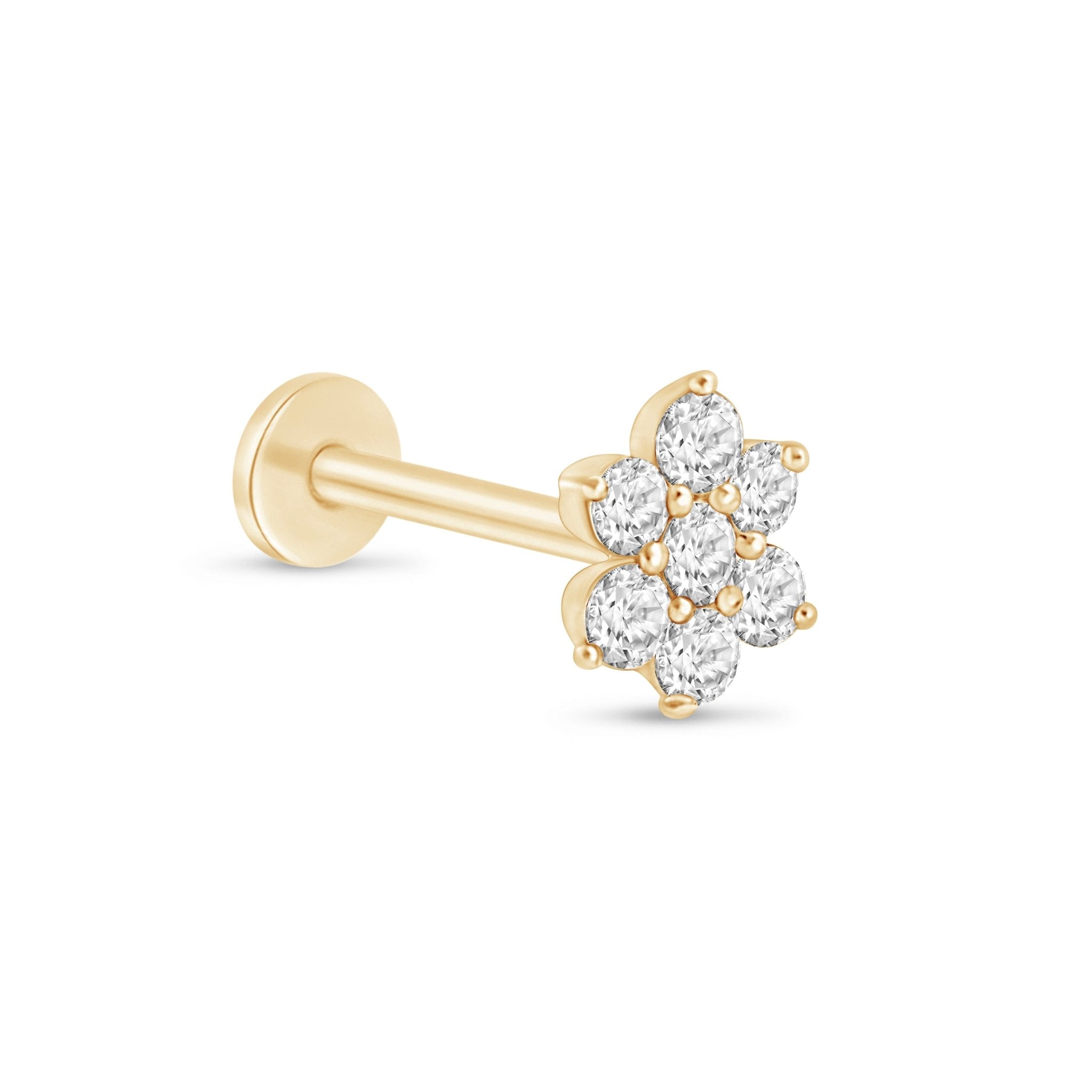 a pair of yellow gold and white diamond flower earrings