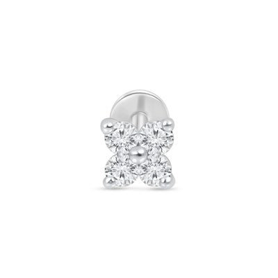 a pair of diamond earrings on a white background