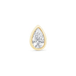 a pear shaped diamond set in yellow gold