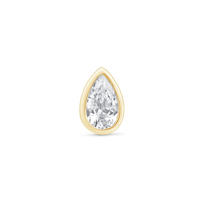 a pear shaped diamond set in yellow gold