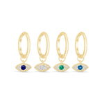 three pairs of gold hoop earrings with blue and green stones