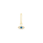 a pair of earrings with an evil eye charm