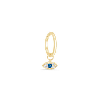 a gold charm with an evil eye charm