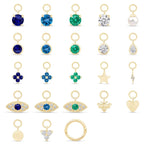 a bunch of different types of earrings on a white background