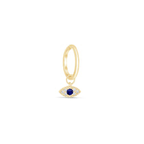 a gold ring with a blue evil eye charm