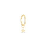 a gold hoop with a small star hanging from it