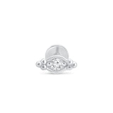 a white gold ring with a diamond in the middle