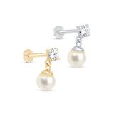 a pair of pearl and diamond earrings