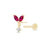 a pair of earrings with a butterfly and a diamond