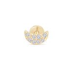 a gold plated ring with white stones