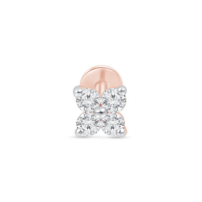 a pair of diamond earrings on a white background