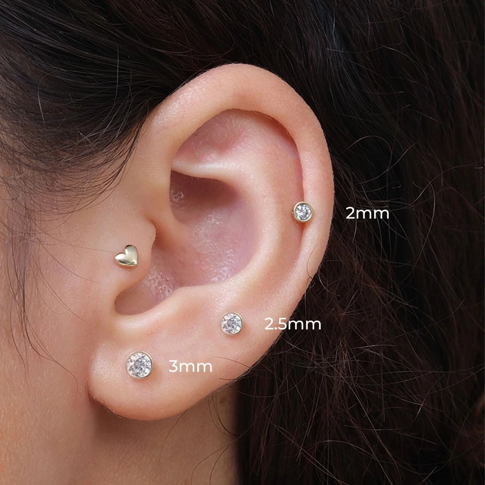 an image showing a cubic zirconia stud earring in three sizesan image showing a cubic zirconia stud earring in three sizes