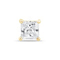 a princess cut diamond set in yellow gold