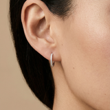 Tiny Diamond Huggie Hoops in 14k White Gold