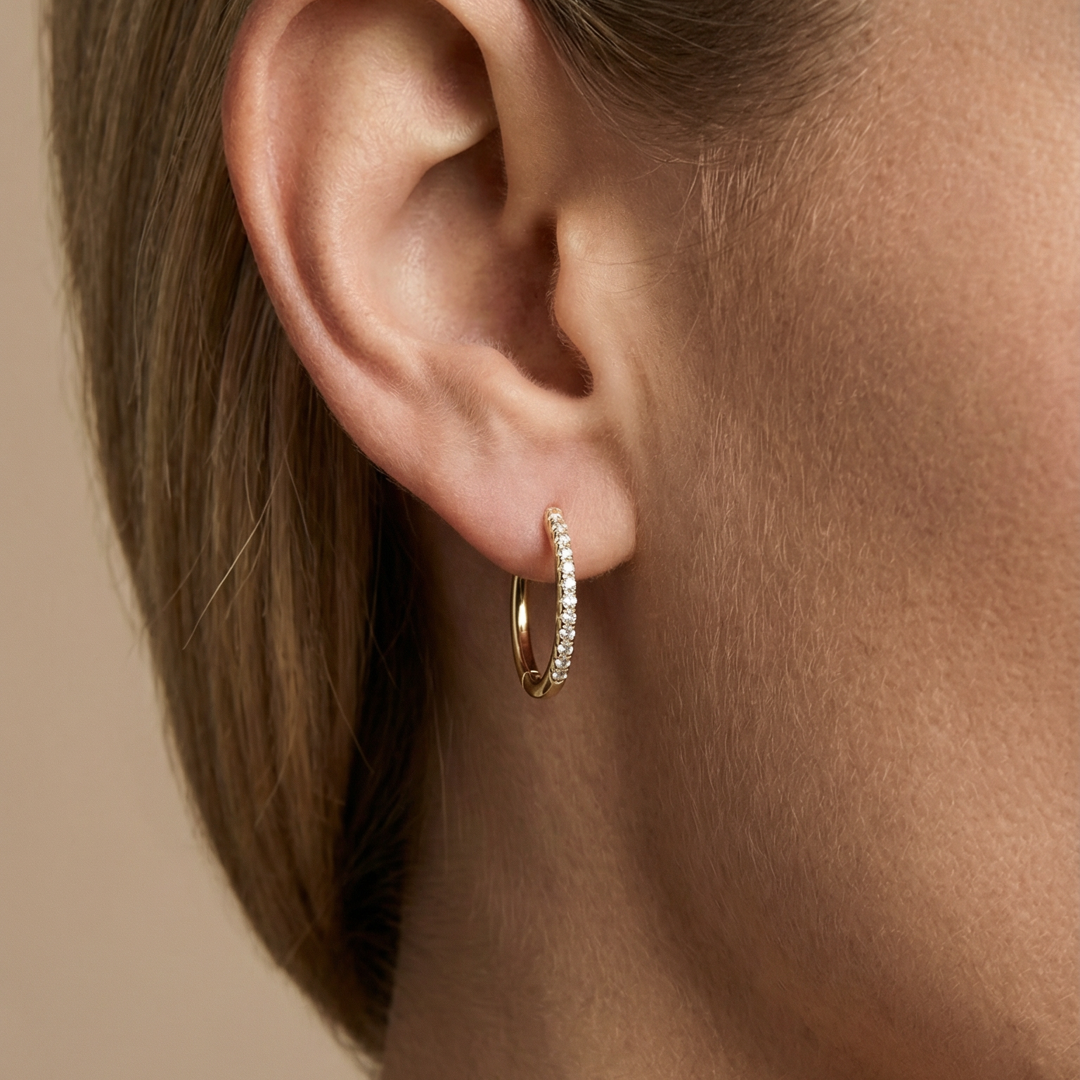 Tiny Diamond Huggie Hoops in 14k Yellow Gold