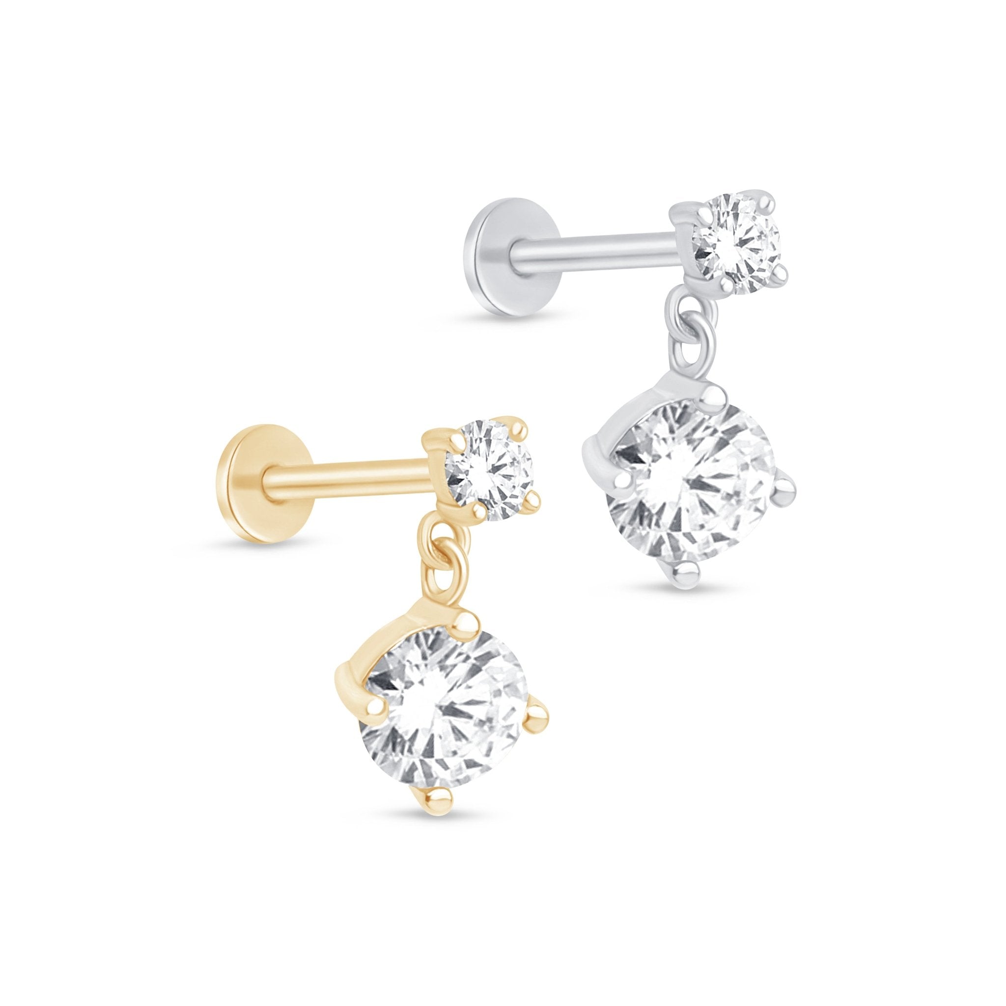 a pair of gold and white diamond earrings