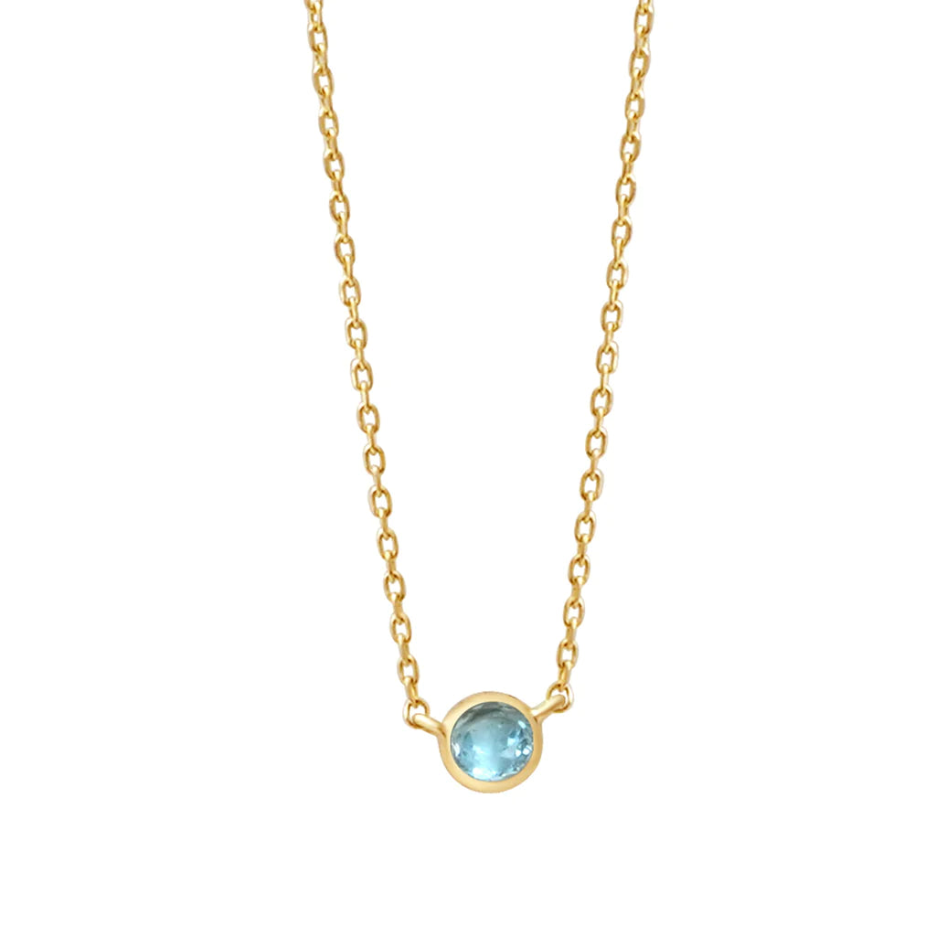 a yellow gold and aquamarine birthstone station necklace