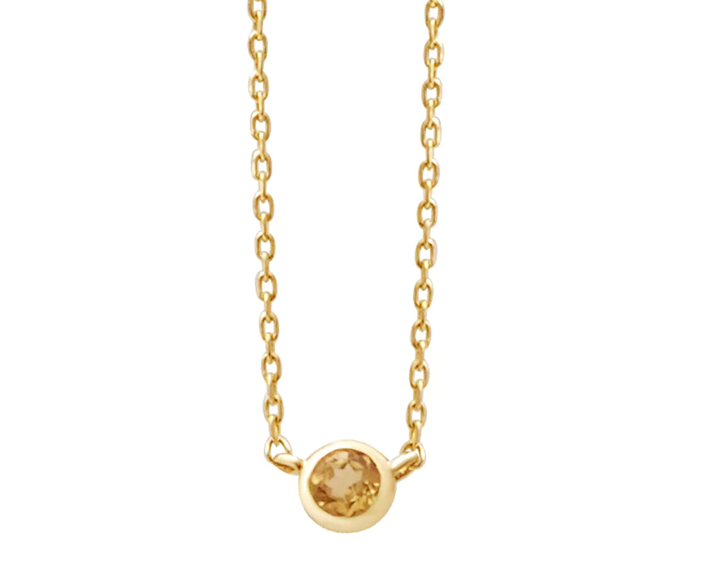 a yellow gold and citrine birthstone station necklace