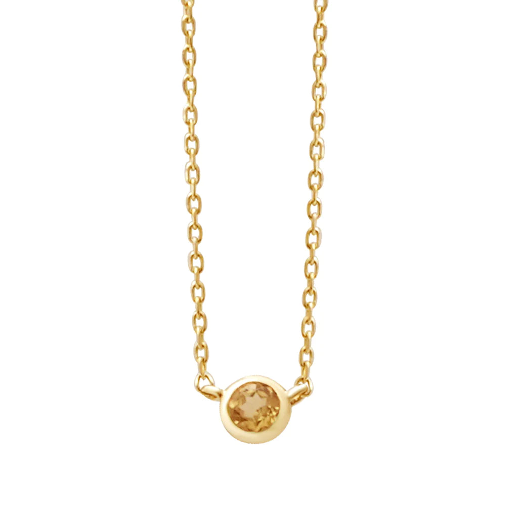 a yellow gold and citrine birthstone station necklace