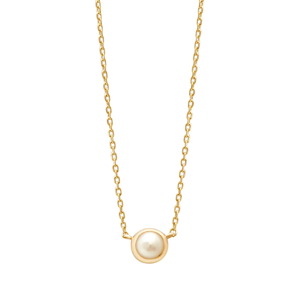 a yellow gold and pearl birthstone station necklace