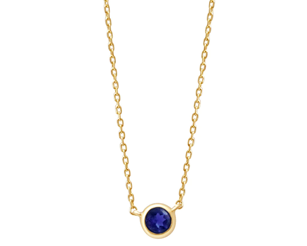 a yellow gold and sapphire birthstone station necklace